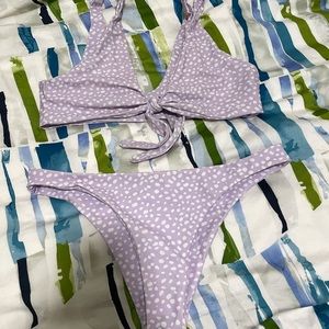 Purple and white dotted swim suit - never been worn